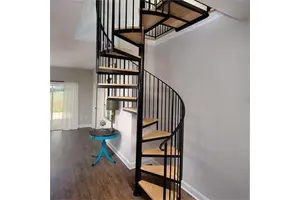 Elegant Indoor Spiral Staircase Helical Stair Design With Steel Structure and Solid Wood Steps for Luxury Interior