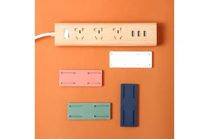 Self-Adhesive Punch-Free Desktop Mobile Plug-In Socket Fixer Holder Bracket Stand Wall Mount Home Power Strip Hanging Fixator