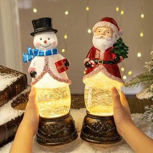 Christmas decorations: Santa Claus lanterns, oil lamps, music boxes, snowflakes, , crystal balls, gifts