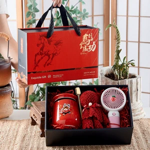 Gift set for ladies for Mother's Day including a coffee cup, eternal rose, towel, teddy bear and artificial flowers in mini size