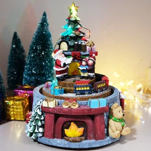 Hot Sale Christmas Gift Resin Christmas Tree Santa Rotating Train Musical Light Christmas Ornaments Decorations