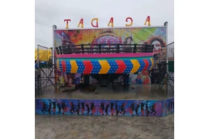 Amusement Park Carnival Features Thrilling Spinning Disco TAGADA Wheel with Dazzling Lights and Music