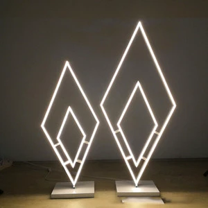 New Double-sided Luminous Props Wedding Diamond Road Leads to Decorative Lights on the Background of LED Strip Runway.