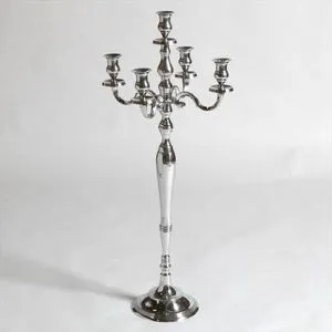 Metal candelabras ideal for church ceremonies lighting adding royal charm to traditional religious gatherings