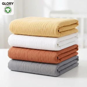 GOTS Certified 100% Organic Cotton Muslin Swaddle Blanket Custom Solid Color Private Label Double Layer Gauze Receiving Wrap