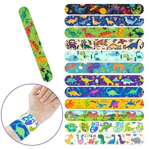 Lin Xu Printed Cartoon Toy Dinosaur Theme Party PVC Adjustable Size Snap Ring Egg Footprint Jurassic Ring Bracelet Interactive