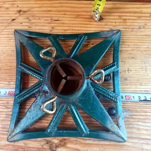 Vintage Christmas tree stand. Old cast iron Christmas tree stand. Decoration for the New Year tree. a Christmas gift.
