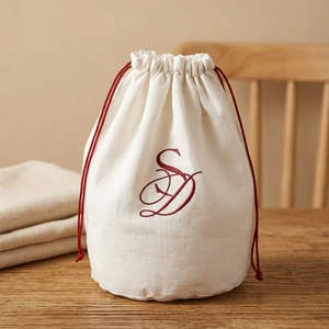 Eco-Friendly Round Bottom Cotton Linen Drawstring Cosmetic Bag Portable Muslin Gift Candle Packing Pouch With Custom Logo