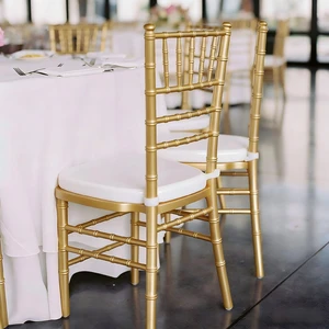 Low Price Wholesale Stackable Hotel Banquet Party Events Bulk Plastic Chiavari Gold Chavari Dining Outdoor Chairs