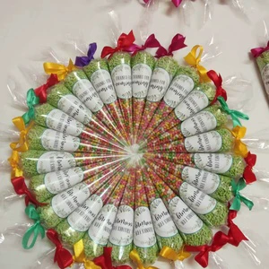 Elegant Confectionery Cones for Every Occasion handcrafted party favors multi hued sugar pearls spectrum of satin ribbons