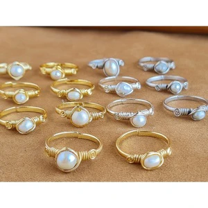 Gold and Silver Plated Pearl Rings with Detail for Resale Markets