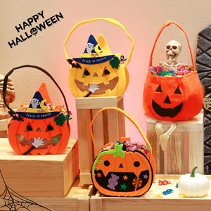 Factory Price New Halloween Ghost Festival Pumpkin Bag Non-Woven Fabric Decorative Props for Candy and Gift Bag Candy Basket