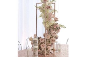Attractive floral wedding centerpiece with antique metal craftsmanship for luxury table decor and wedding themes