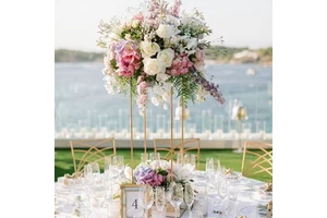 Stylishly crafted floral arrangement iron wedding centerpiece for elegant and vintage-inspired wedding table decor