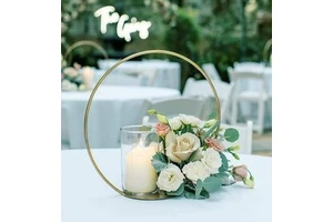 Handcrafted Gold Metal Wedding Table Centerpiece with Artistic Floral Engravings and High Quality Construction for celebrations
