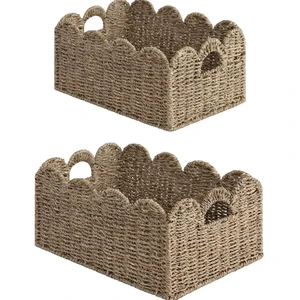 Scalloped woven basket for organization, storage cabinets and baskets made from natural, creating a warm and safe space.