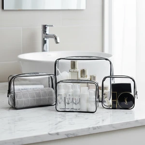 Wholesale Portable Waterproof Clear Small Capacity Travel Toilet Bag Organizer with Zipper Closure PVC Cosmetic Bag Soft Handle