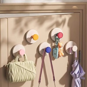 Creative home storage hooks, no need to drill holes, detachable, washable and reusable, with strong load-bearing capacity.