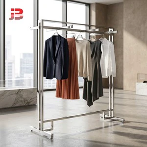 Modern Polished Stainless Steel Double Bar Garment Rack Floor Standing Clothing Display Rack with Wheels for Boutique
