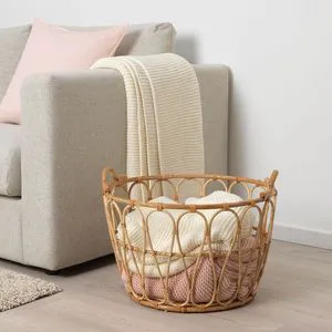 Handwoven rattan basket for premium storage solutions in kitchens living rooms and offices with a natural rustic texture
