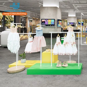 Trendy Kids Store Interior Design Customized Metal Children Freestanding Boutique Clothing Display Rack For Clothes Shop