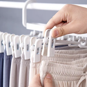 Multi Layer Folding Clothes Dress Hanger Non Slip Plastic Clip Magic Hangers For Pants