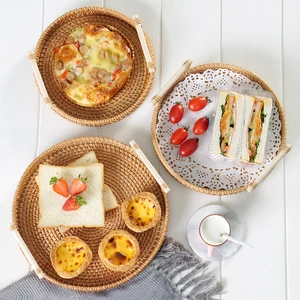 Factory Direct Eco Friendly Handwoven Round Food Snacks Bread Fruit Rattan Wicker Picnic Storage Baskets Tray With Handle