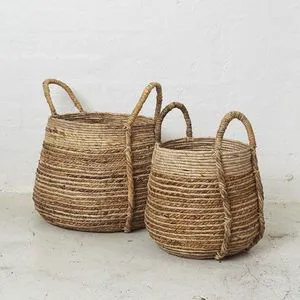 Decorative handwoven rattan basket for kitchen and home storage with durable construction and modern look