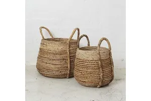 Decorative handwoven rattan basket for kitchen and home storage with durable construction and modern look