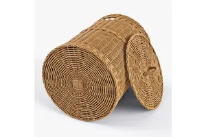 Elegant round rattan basket perfect for floral arrangements or fruit displays in kitchens dining areas or cafes