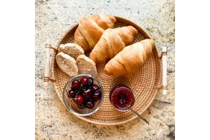Wholesale Eco-Friendly Durable Rattan Wicker Handwoven Breakfast Serving Basket with Home Decor Handles for Home Storage