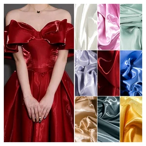 YX60 Luxury Shiny Metallic Reflective 100% Polyester Liquid Organza Satin Fabric Soft Satin Liquid Mikado Fabric