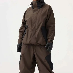 OEM Custom Dark Brown Women Baggy Ski Suit Set Designer Waterproof Windproof Baggy Ski Pants Ski Jumpsuit Snow Suit Wholesale