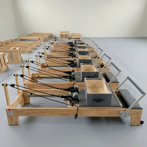 Factory Direct Professional High-End Oak Wood Reformer for Studio Home Use Custom Logo Hot Sale Wood Pilates Reformer