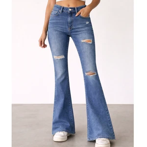 Wholesale Women Elastic Waist Baggy Flared Denim Jeans Mid Waist Vintage Bottom Casual Summer Fashion Pants Knee 100% Cotton