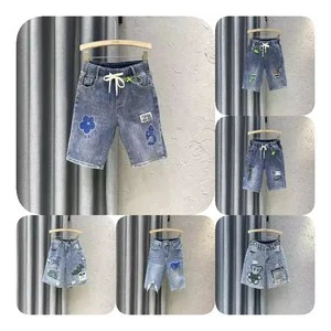 European & American Autumn Women's Stretchy Mid-waisted Breathable Sporty Denim Shorts With Fringe