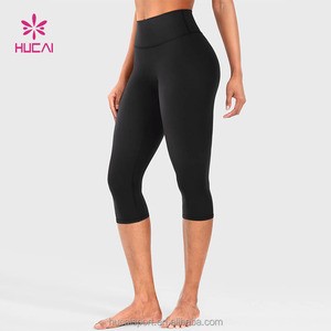 ODM HUCAI Custom Logo Quick Dry High-waisted V-back Scrunch Contour Sports Workout Gym Fitness Women Yoga Capri Leggings