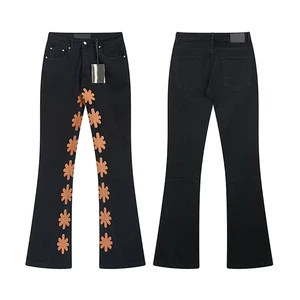 Factory Direct Manufacturer Pantalon Jeans Homme De Luxe Denim Flower Patches Men's Flared Pants Black Bootcut Mens Jeans