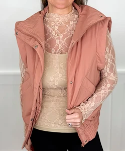 Custom Women's Stand Collar Zip Up Snap Button Sleeveless Puffer Vest Elastic Hem Side Pocket Lightweight Waistcoat Manufacturer