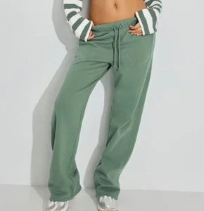 Women's Soft Breathable Fleece Terry Cotton Sweatpants Custom Logo Printed Wholesale Solid Color Plain Bottoms Mid Waist Flare