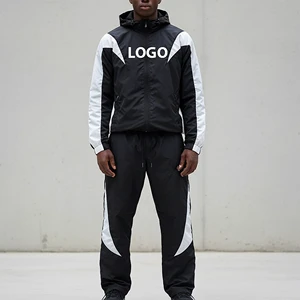 OEM Regular Cotton Loose Jacket Pants Tracksuits Custom Logo Two Tone Winter Printed Jogging Color Block Tracksuits 2 Piece Set