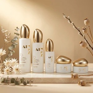New Design Premium Luxury Gold Cap Glass Cosmetic Packaging Set Silk Print White Frost Lotion Bottle Set