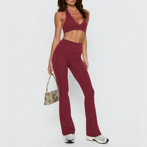 Women's Solid Yoga Set with Flared Pants & Strappy Sports Bra-Seamless Breathable Workout Outfit for Pilates/Running Front Logo