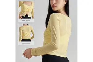 2025 New Style Lightweight Breathable Yoga Top Long Sleeves Twisted Design Casual Fitness Clothes Loose Pliates Top Front Logo
