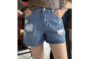 Wholesale women's denim shorts with stylish holes and washed water shorts are suitable for ladies.