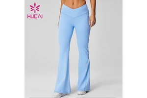 ODM HUCAI Custom logo Breathable Nylon Spandex V Shape High Waist Flared Legs Fitness Gym Flare Yoga Pants Leggings