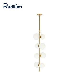 Sleek ModernRail Pendant Lamp Brass Finish with White Glass Spheres for Contemporary Interiors