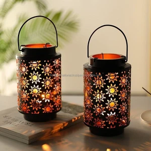 Metal Cylindrical Lantern With Floral Cutout Design Handle Home Decoration Candle Holder