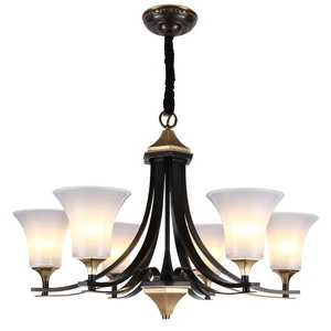 Country chandelier with a glass lampshade and brass decoration for the living room and dining room