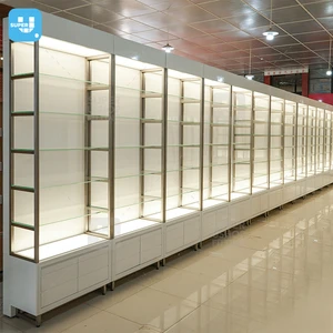 Custom Skincare Store Furniture Wooden Perfume Shop Boutique Wall Display Cabinet LED Light Glass Cosmetics Display Shelf